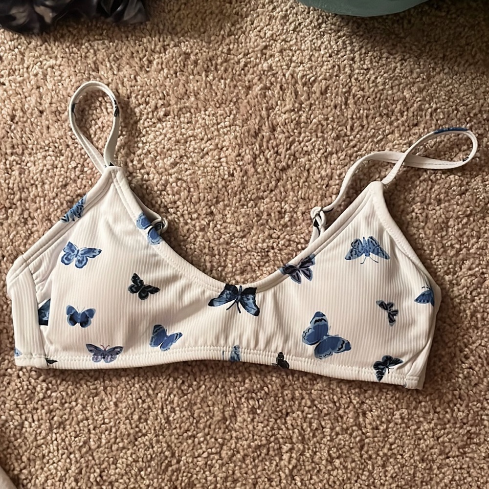 a blue butterfly bikini top